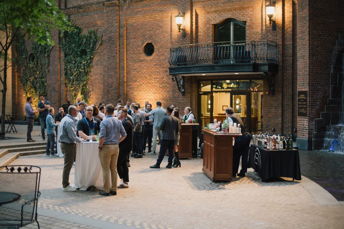 Client Summit 2026 attendees at the welcome reception in The Garden at Heinz Hall in Pittsburgh
